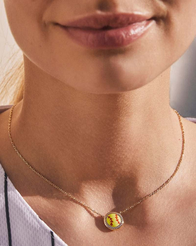 Gold chain necklace with a chartreuse magnesite pendant featuring an adjustable slider.
