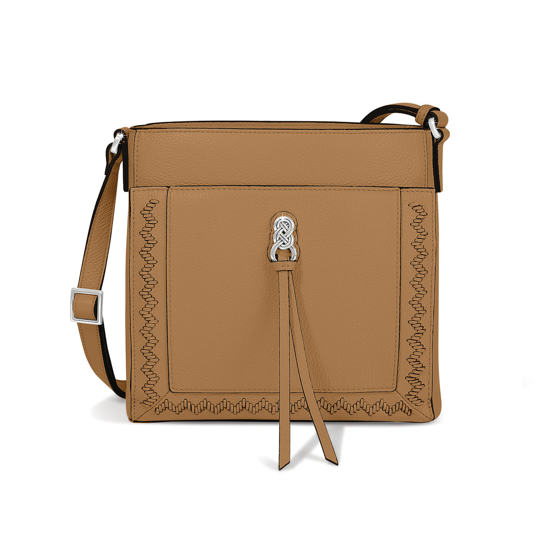 Astrid Organizer Bag in tan leather with adjustable strap, zip top closure, and multiple interior pockets.