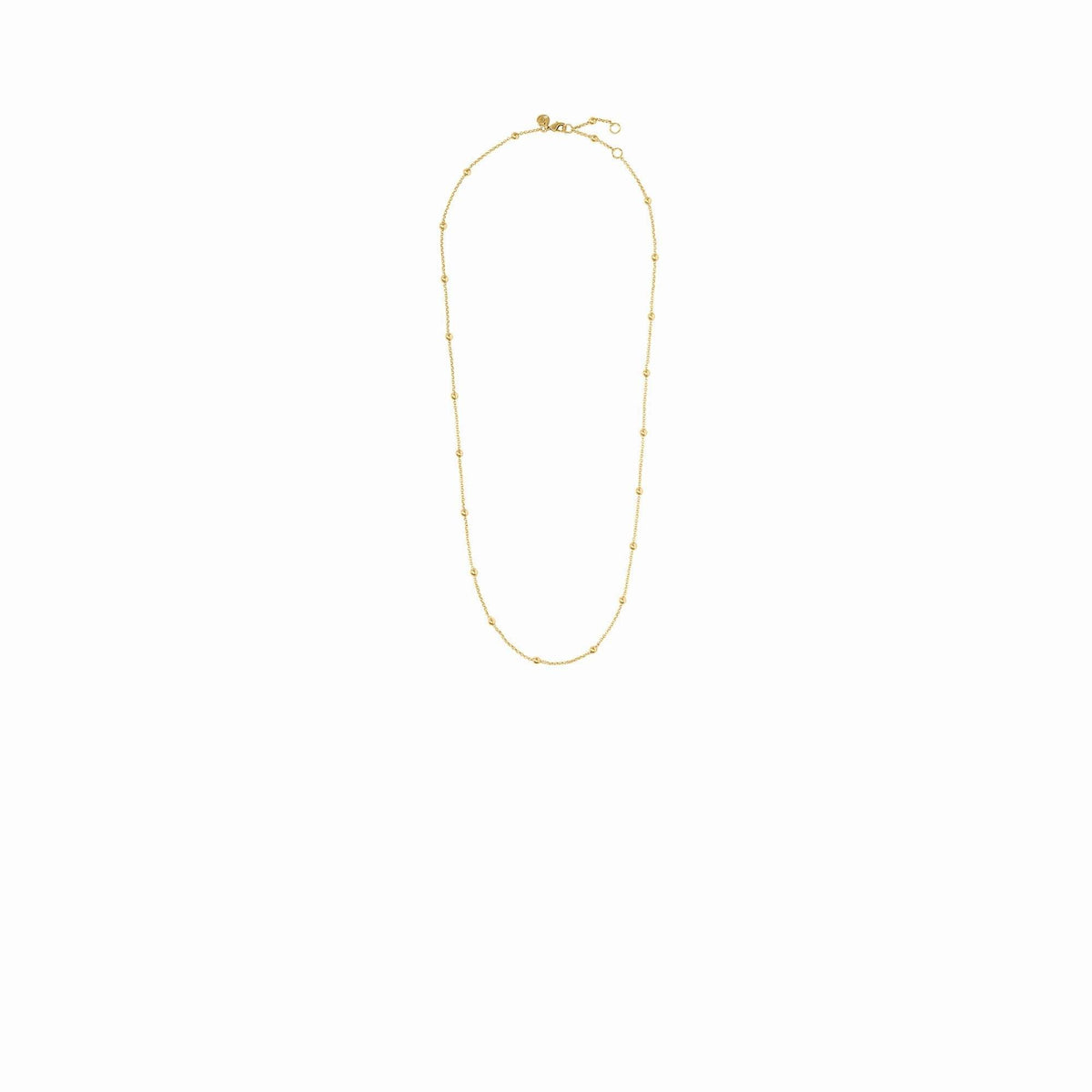 Gold Solara Delicate Station necklace with radiant station charms on a chain.