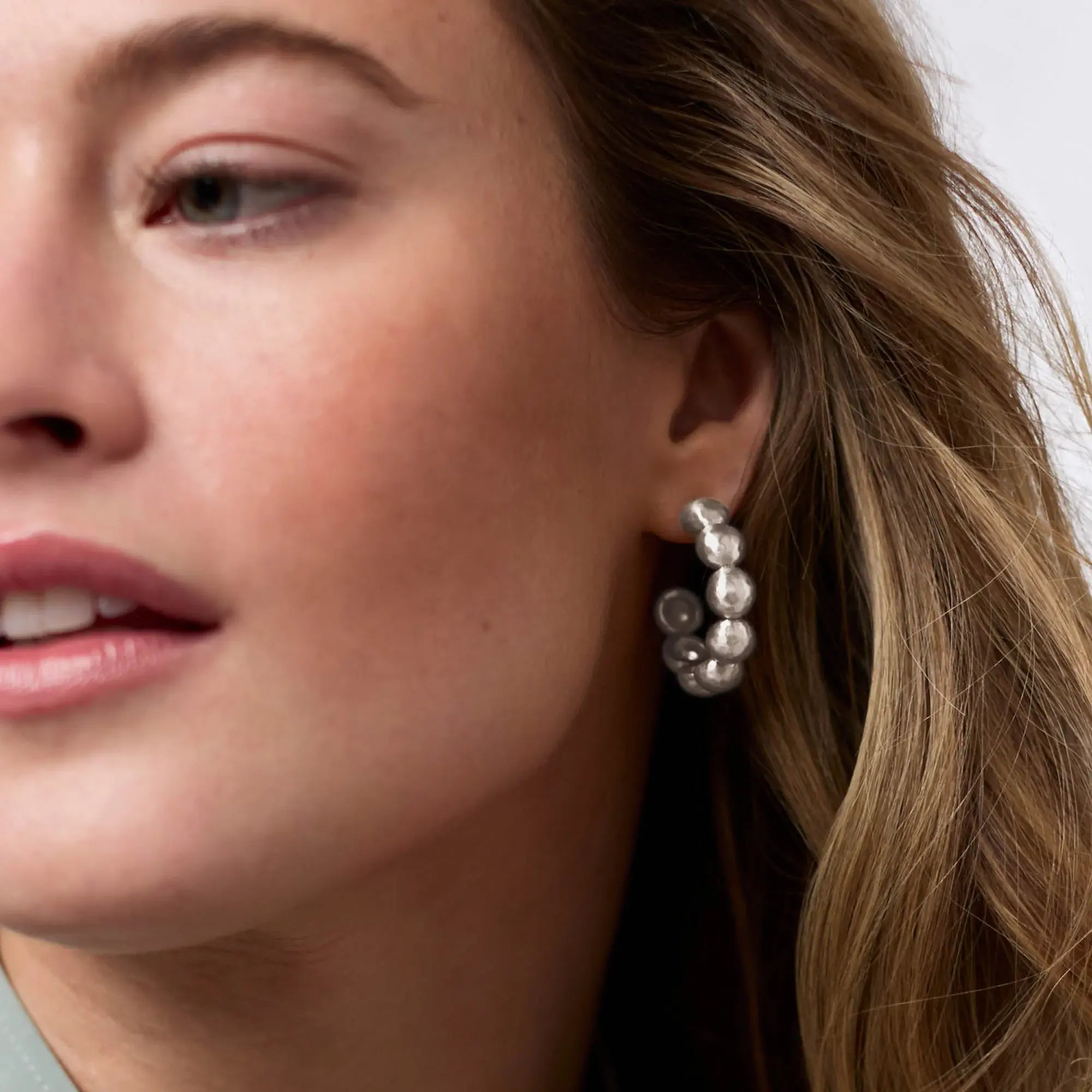 Silver plated hoop earring with sculptural post-back
