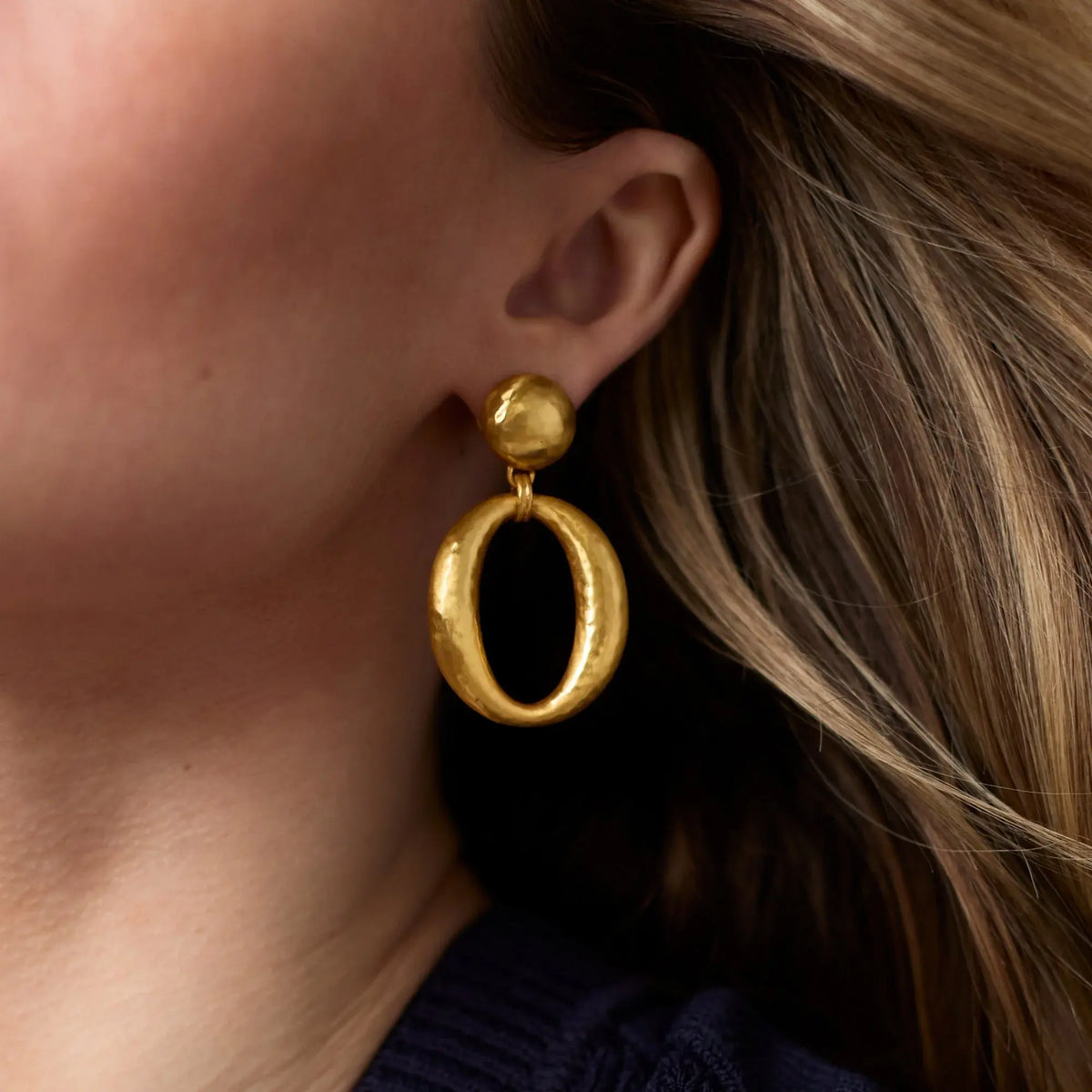 Gold-plated Solara Orbit statement earring with circular orbit design