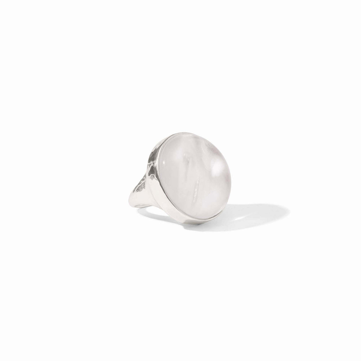 Polished silver statement ring with a radiant geometric design featuring imported glass accents.