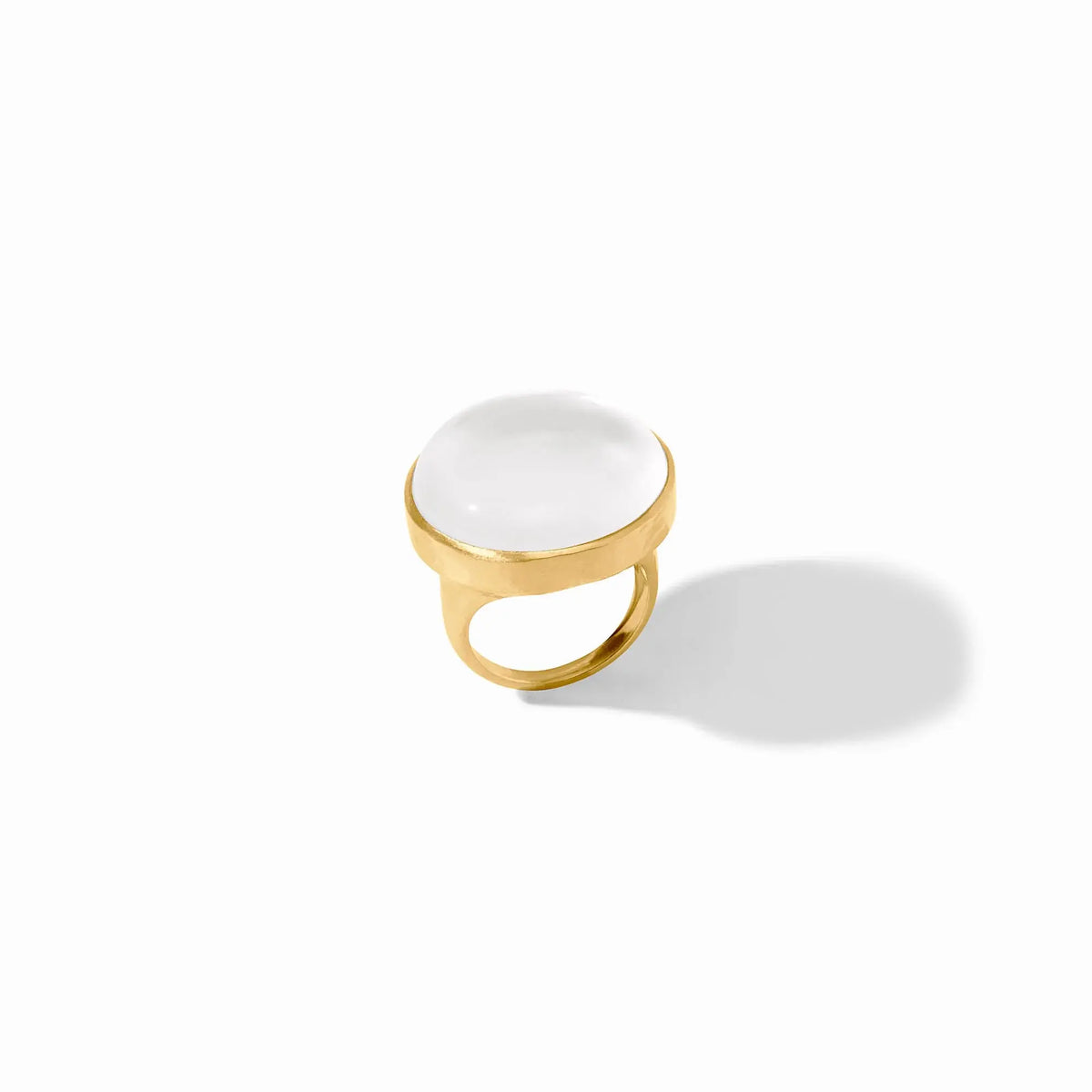 Solara Statement Ring in gold-plated metal with a clear imported glass stone set on an open band.