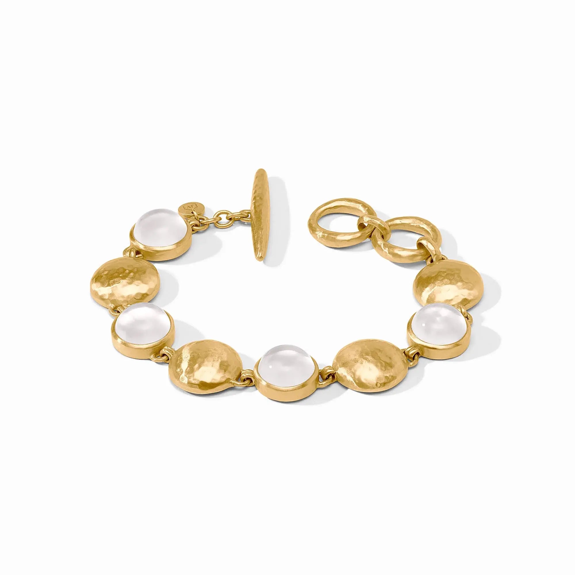 Adjustable gold Solara Stone bracelet with iridescent clear crystals on a toggle clasp.