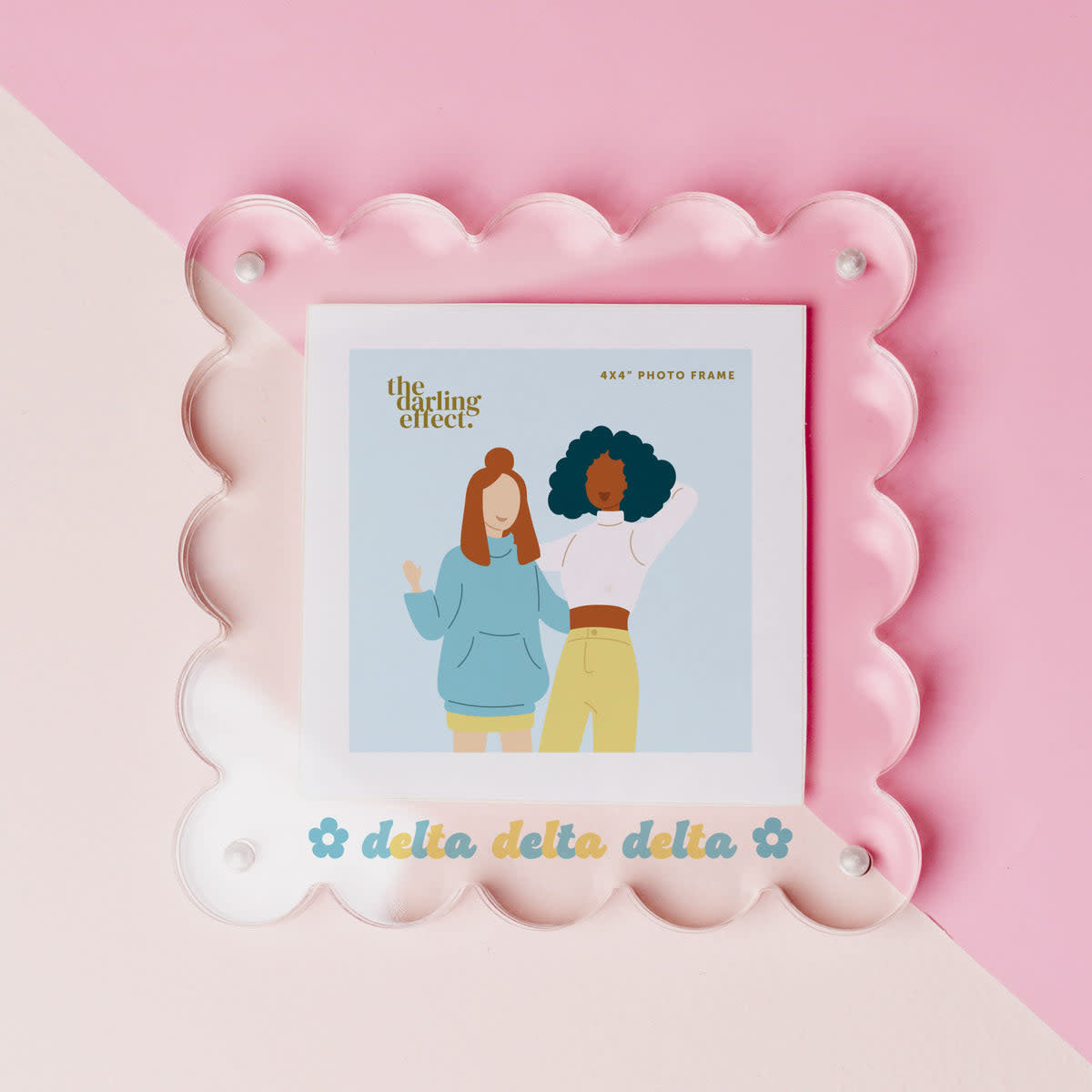 Clear acrylic square picture frame with sorority Delta Delta Delta text on front.