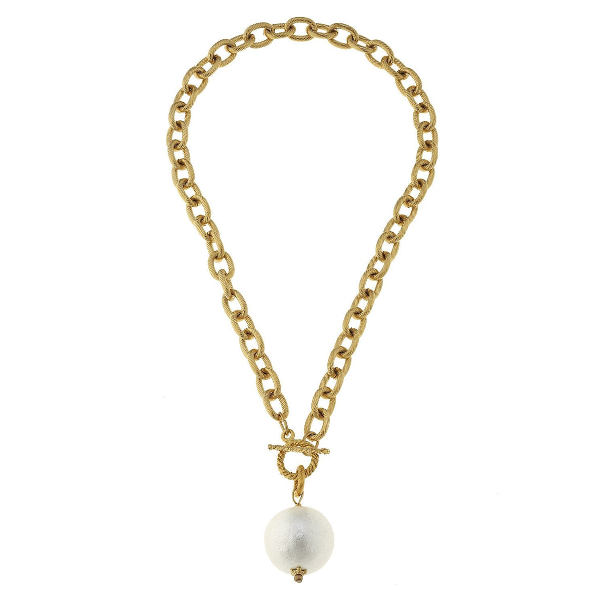 Gold chain necklace with a toggle clasp and a large white cotton pearl pendant.