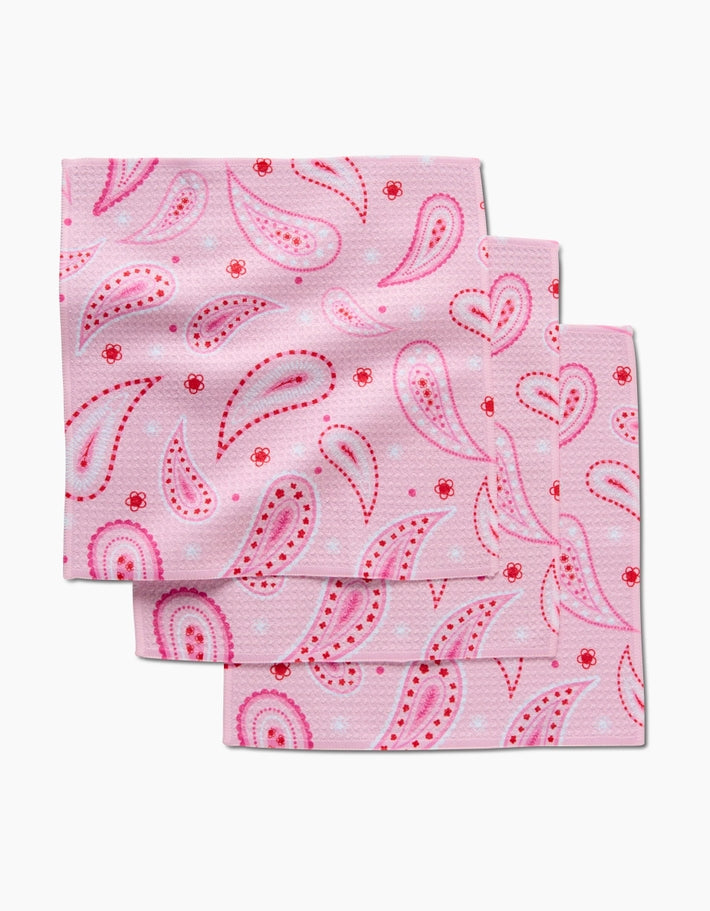 Set of three waffle weave dishcloths in recycled polyester with single-sided prints and hang loops.
