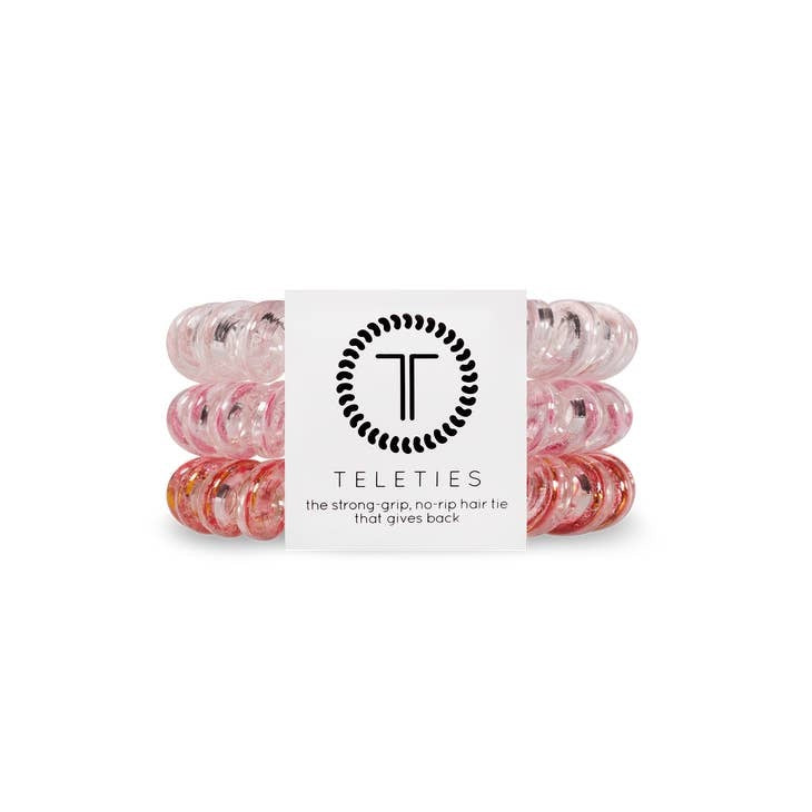 Three large black spiral hair coils with a twisted texture designed as strong-grip ties.