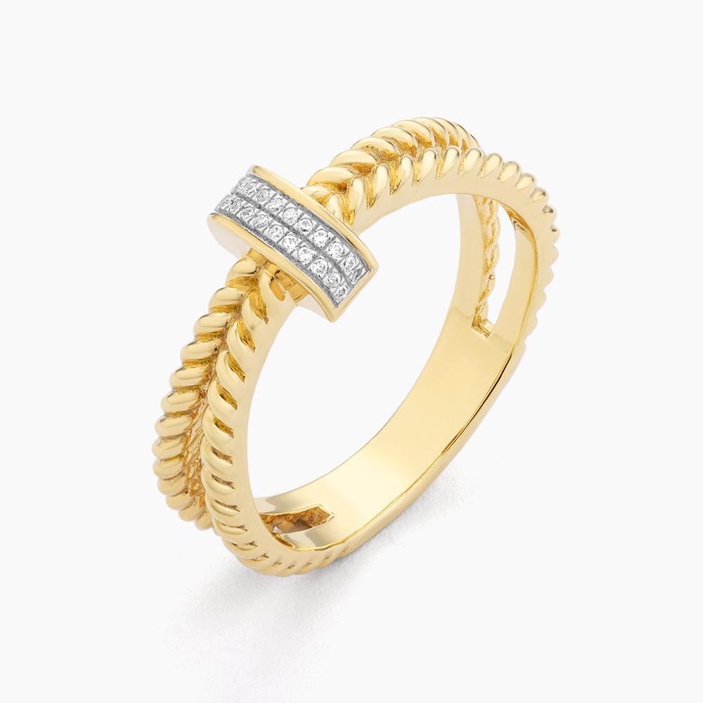 Halfway Point Statement Ring in yellow gold with a twisted band and diamond-studded bar detail.