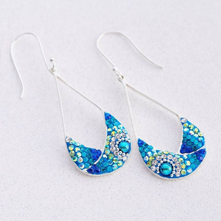 Sterling silver split drop earrings featuring blue Austrian crystals in a faceted geometric pattern.