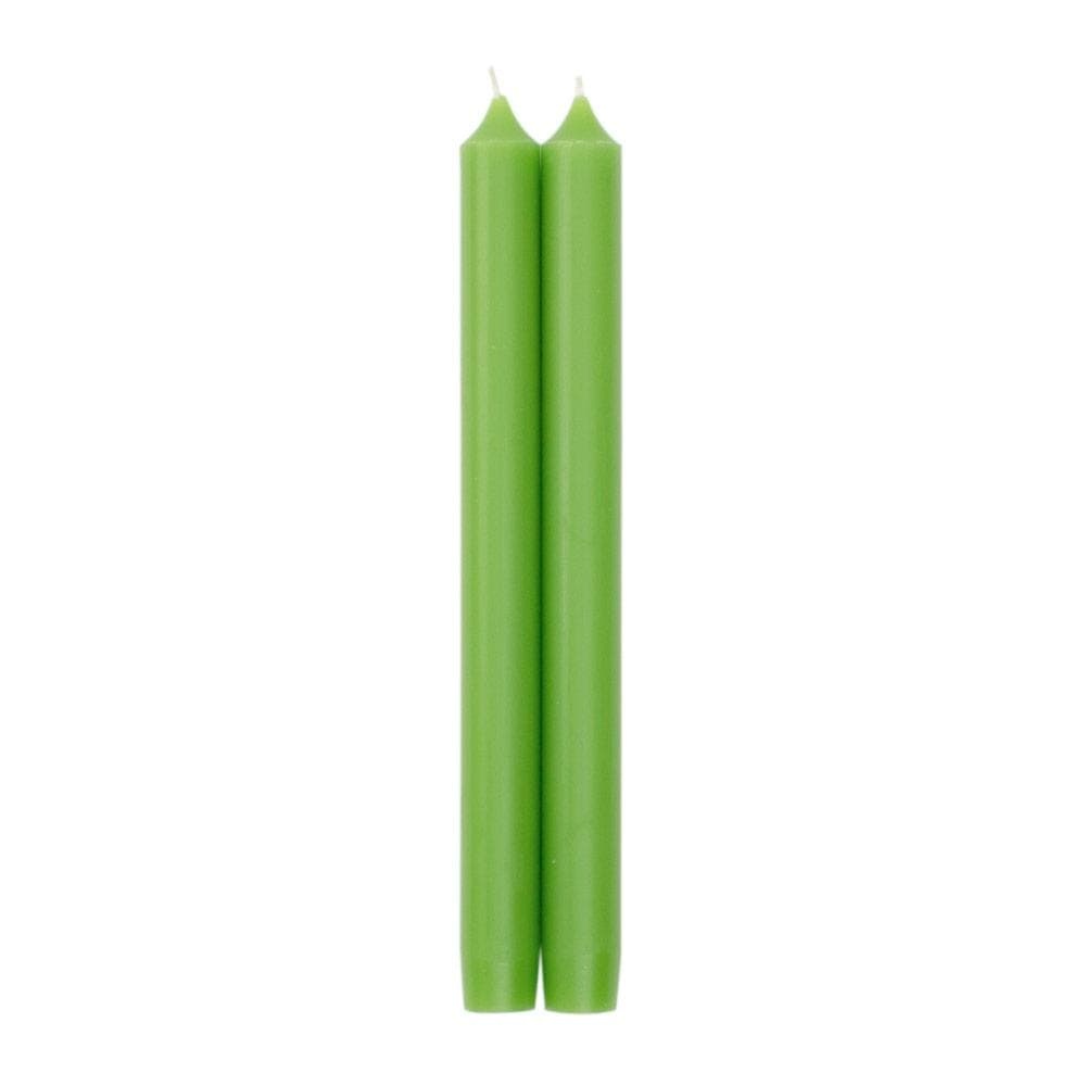 Two spring green tapered candles with a crown top in paraffin and palm wax blend.