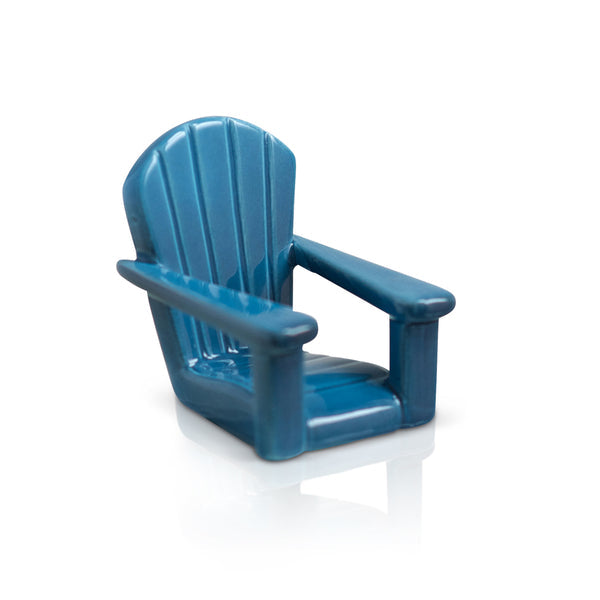 Small blue ceramic Adirondack-style chair figurine with a glossy finish.