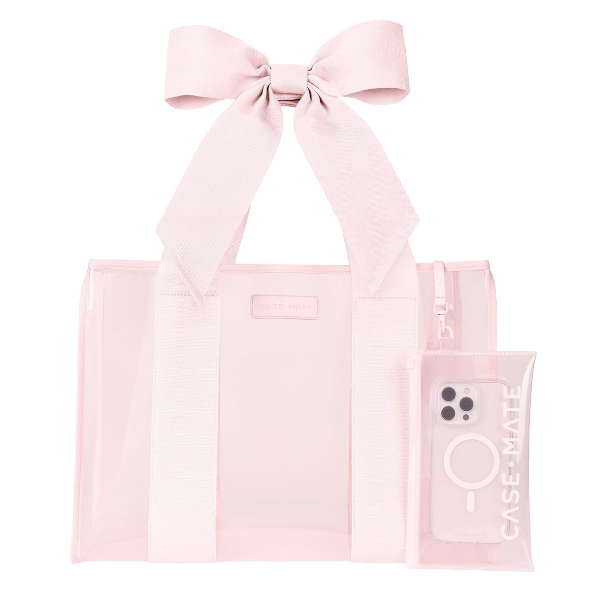 Light pink jelly tote bag with a large bow on the straps and a matching clear phone pouch.