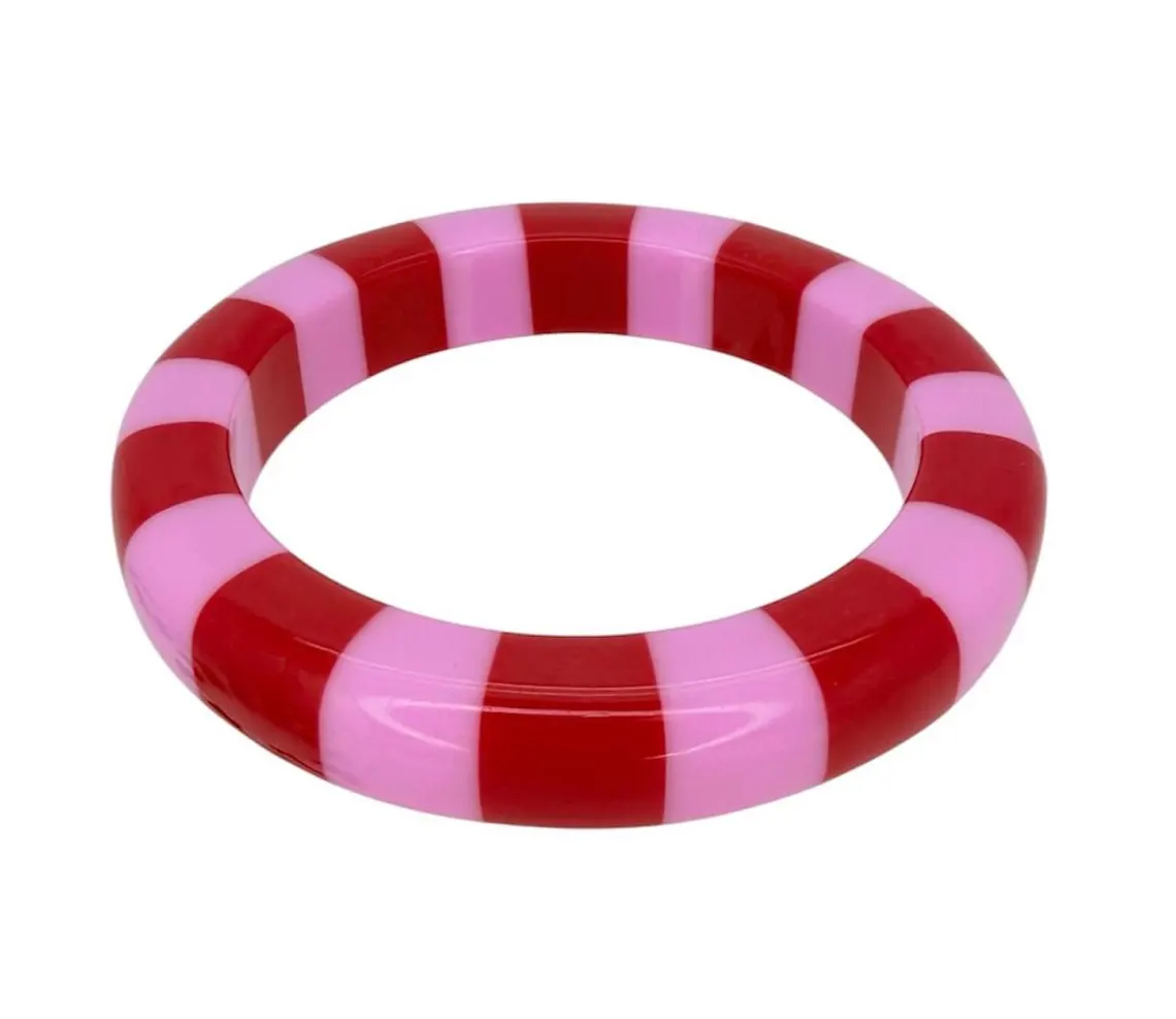 Cabana Cuff Bangle featuring a bold pink and red striped pattern in a smooth, circular design.