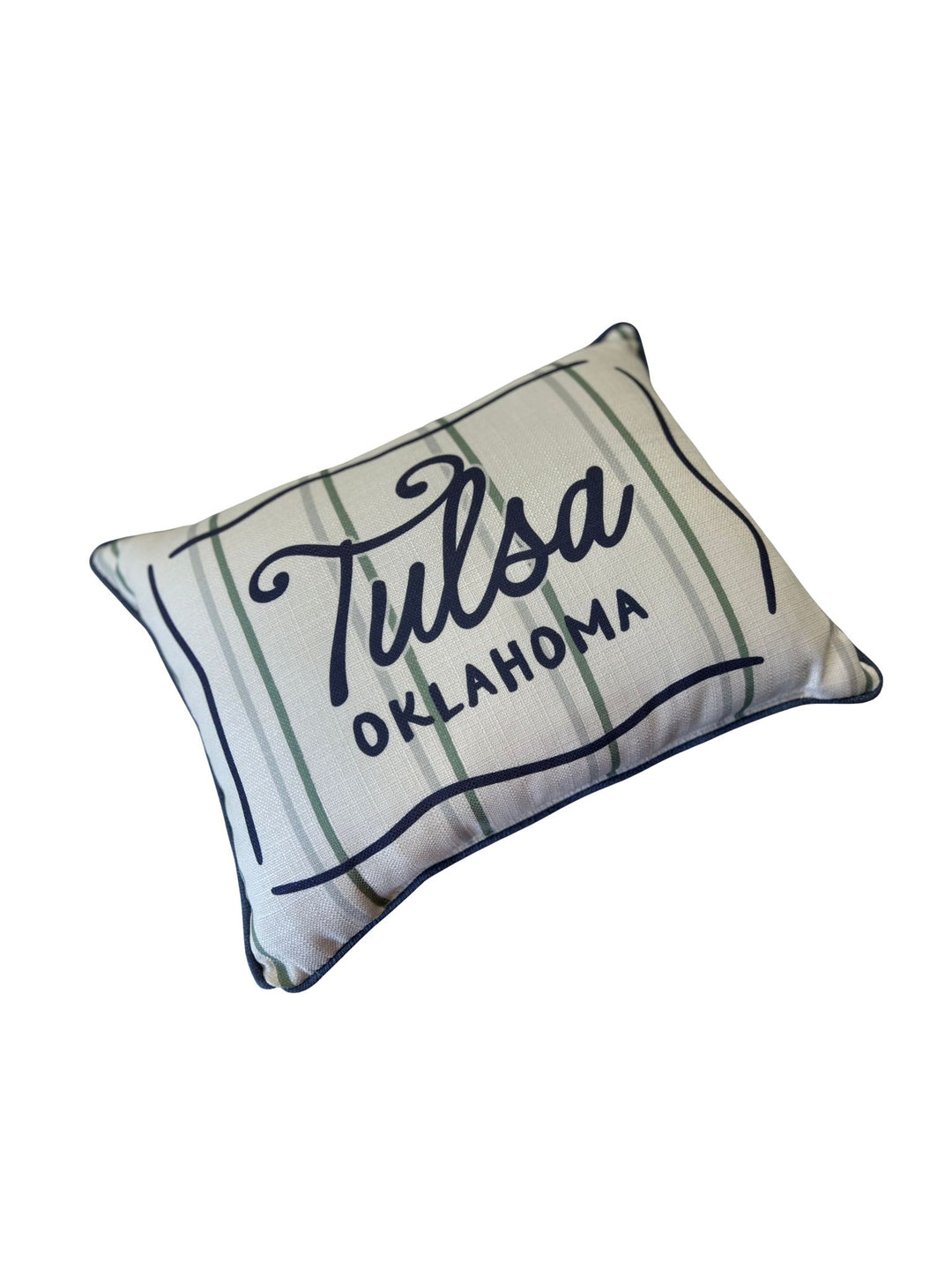 Rectangular pillow with green stripes, navy piping, and "Tulsa OKLAHOMA" printed on the front.
