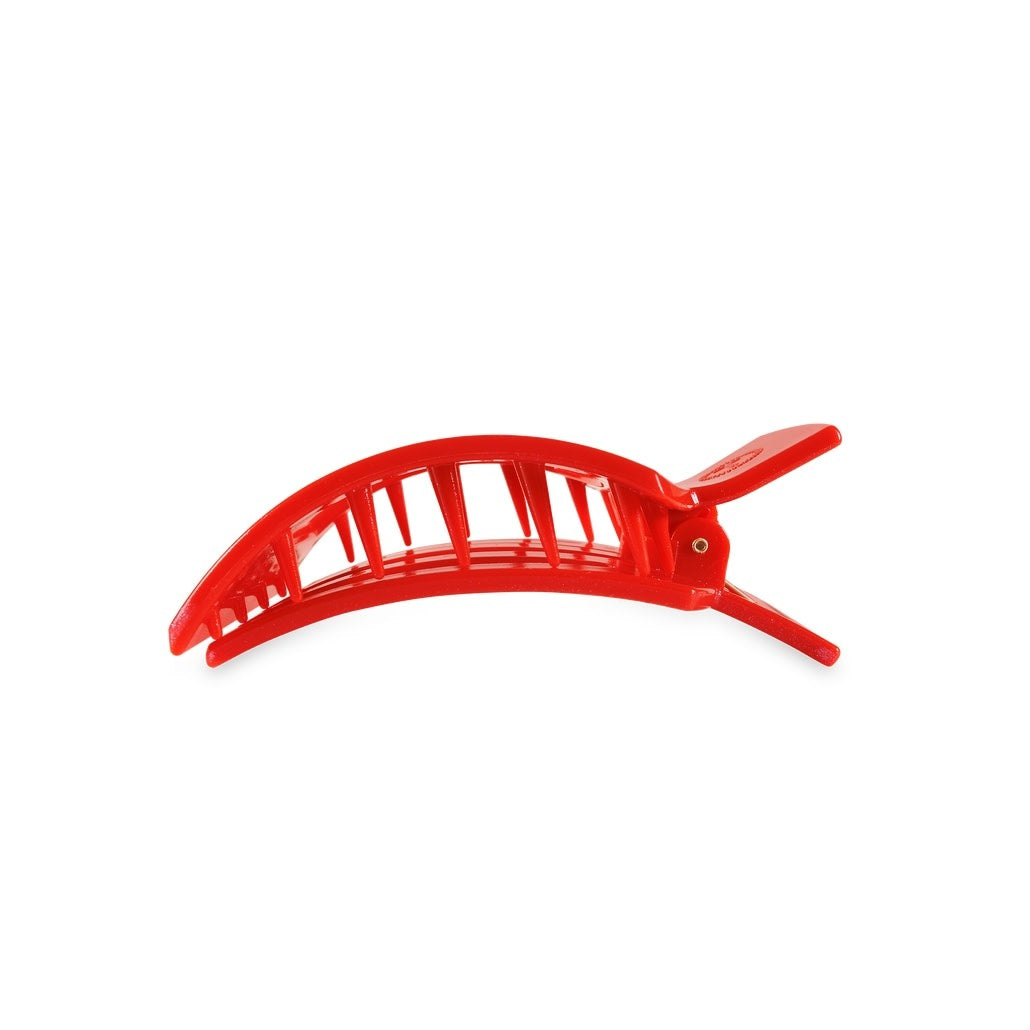 Medium square flat hair clip in matte black plastic with a smooth geometric shape.