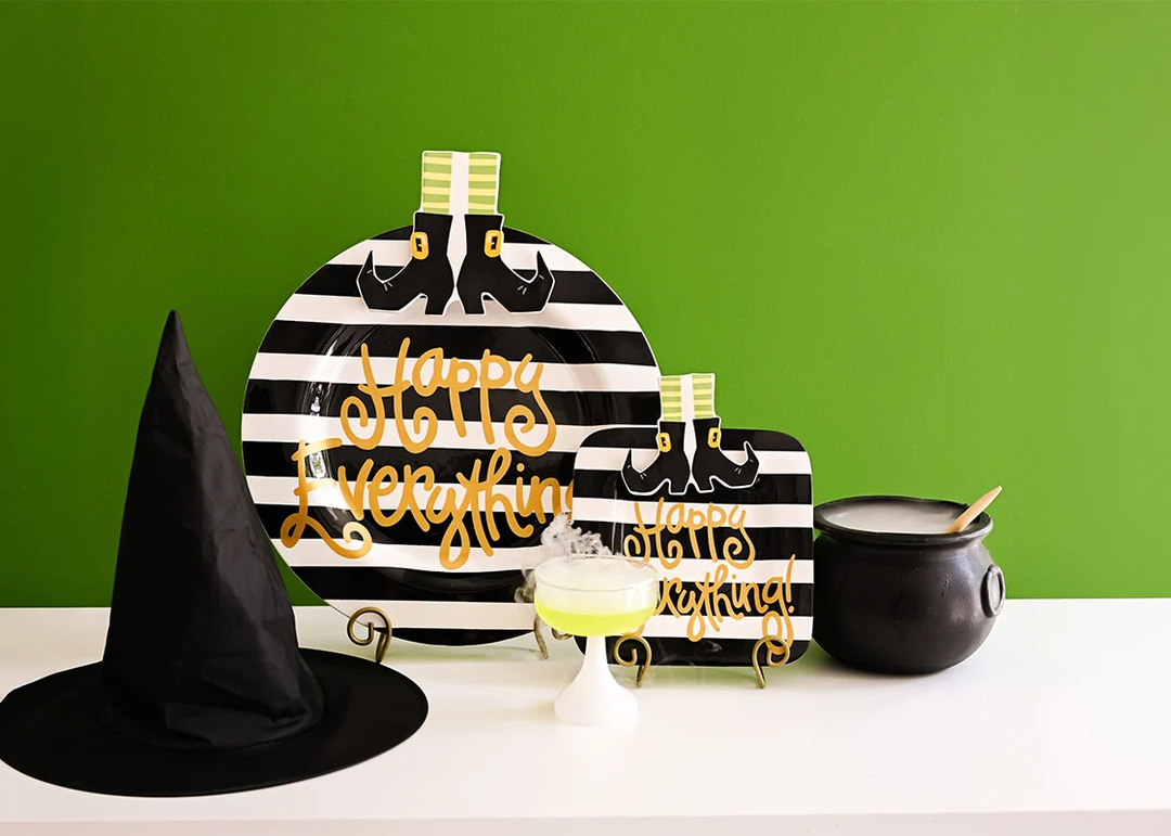 Witchy Witch Boots Mini Attachment on striped Happy Everything plates with a witch hat and cauldron.