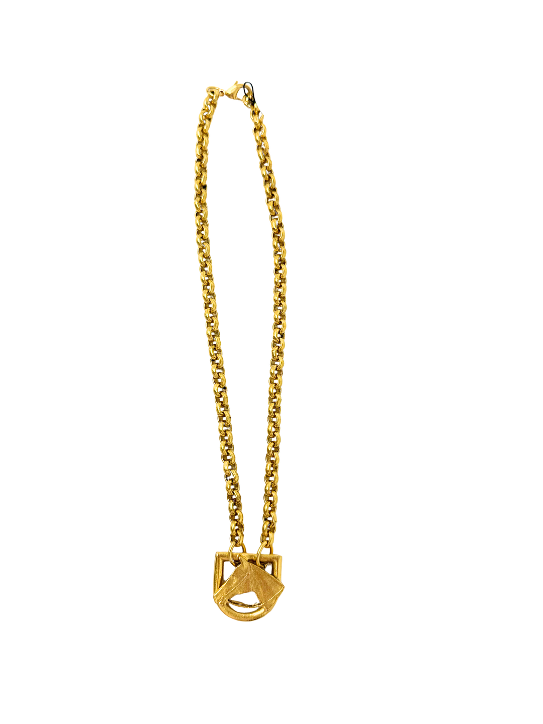 Gold chain necklace with a sculpted horse head motif pendant on a white background.