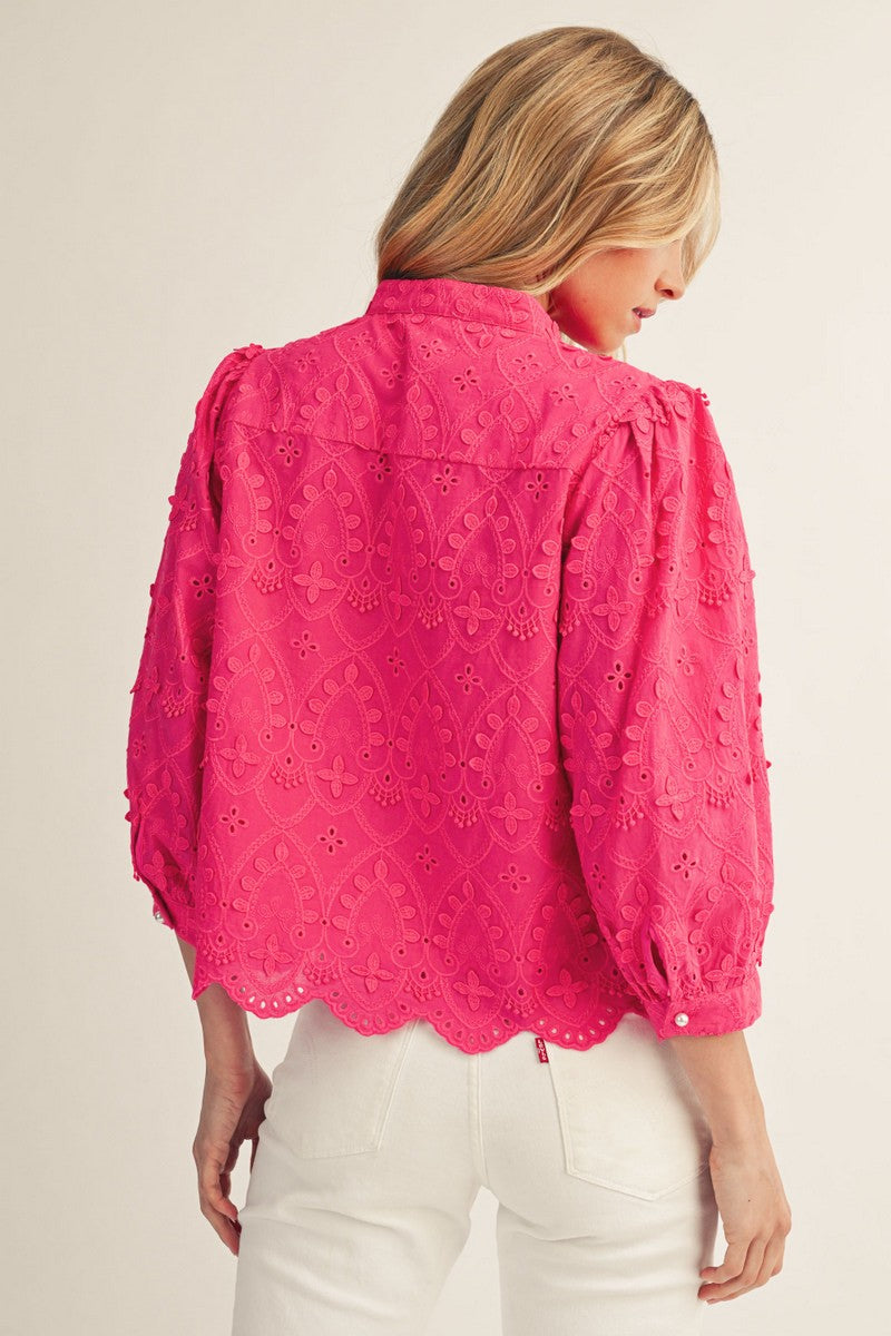 Women's Ariana top in white cotton with v-neck, three-quarter sleeves, and scallop hem.