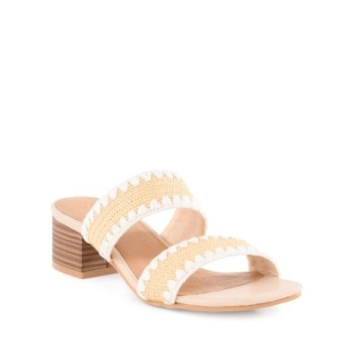 Maui Raffia slide sandals with two woven yellow straps and white zigzag trim on a block heel.