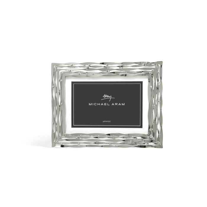 Mirage Frame in nickelplate metal with a convertible rectangular silhouette.