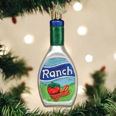 Glass Ranch Dressing bottle Christmas ornament with green glitter neck hanging on a tree.
