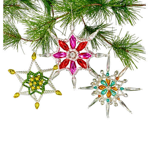 Five-inch winkle star ornament in natural wood finish with carved spiral pattern.