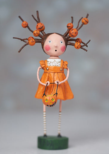Poly resin Twiggy figurine with a slender silhouette in natural beige tone.