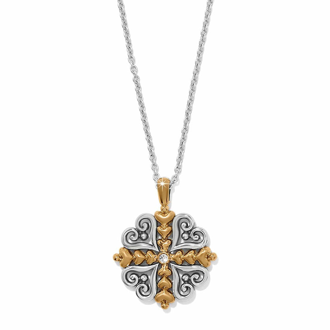 Alcazar Heart Two Tone Necklace with a silver and gold heart-shaped cross pendant and crystal.