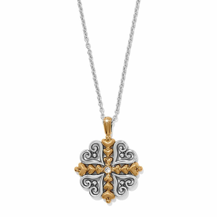 Alcazar Heart Two Tone Necklace with a silver and gold heart-shaped cross pendant and crystal.