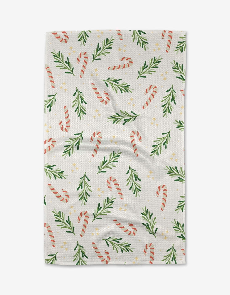 Waffle weave holiday tea towel in red with white snowflake pattern