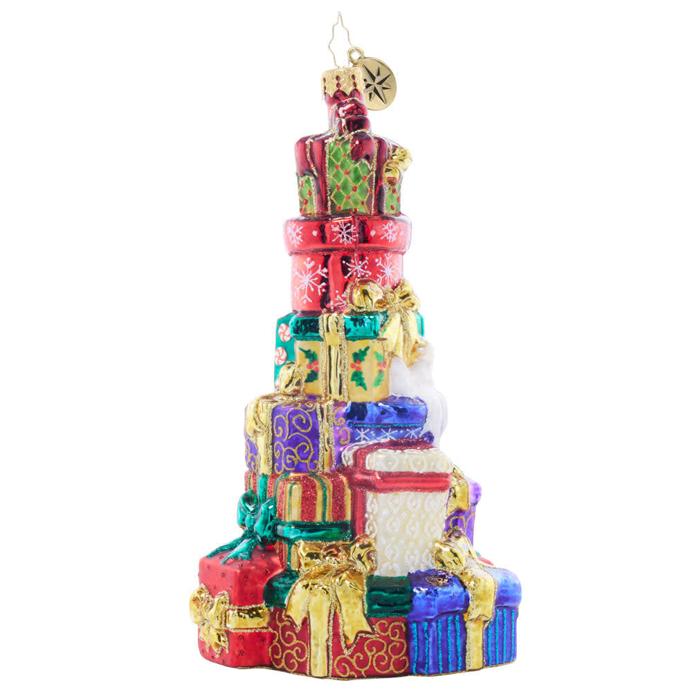 Stacked with Holiday Love decorative tower featuring tiny wrapped gifts in festive colors.