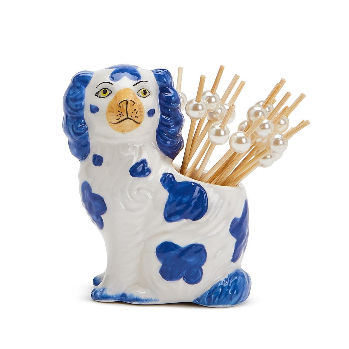 Blue and white hand-painted ceramic Staffordshire dog holding bamboo cocktail picks in a gift box