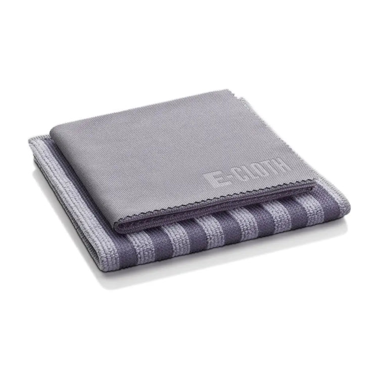 Two folded microfiber cleaning cloths, one solid grey and one with grey and light purple stripes.