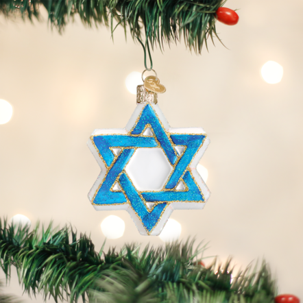 Mouth-blown glass Star of David ornament with hand-painted silver finish and glitter accents.