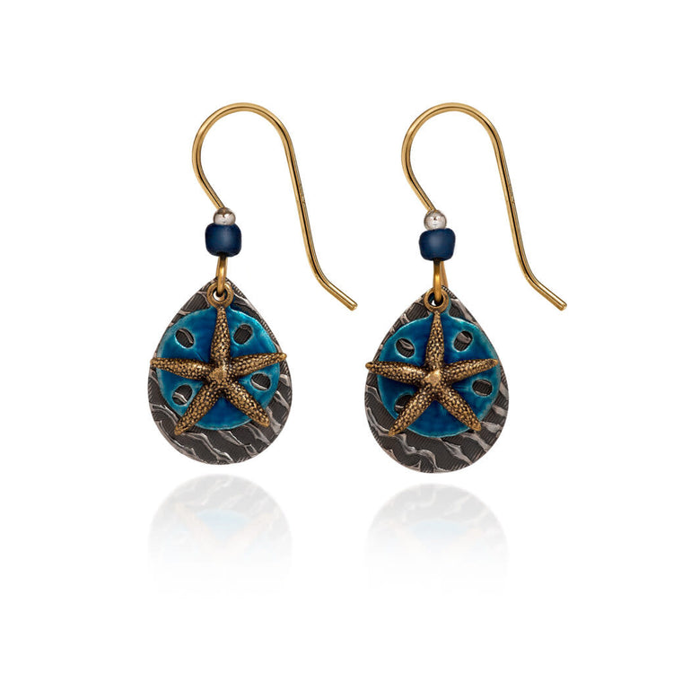 Layered starfish earrings in coastal blue and brass-tone surgical steel with hand-soldered charms.
