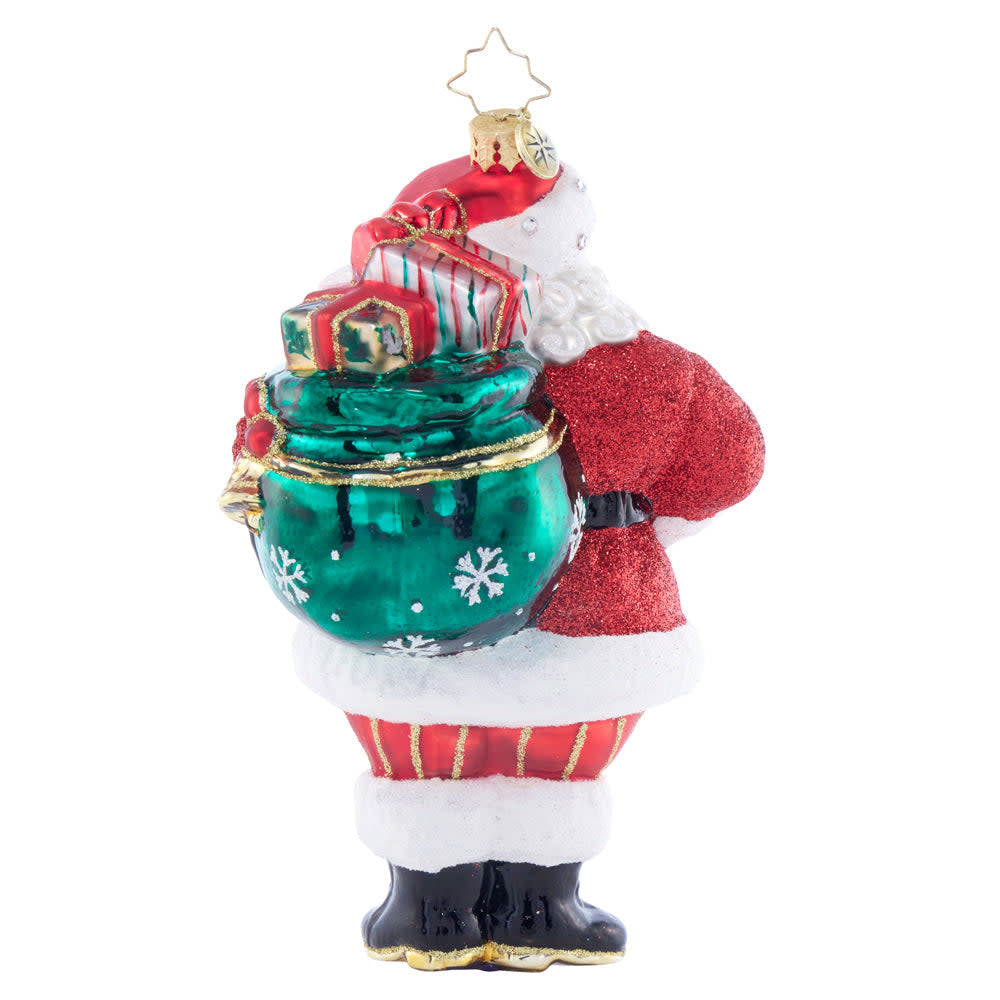 Starlit Holiday Delivery ornament featuring a celestial starburst design with silver glitter accents on a dark background.