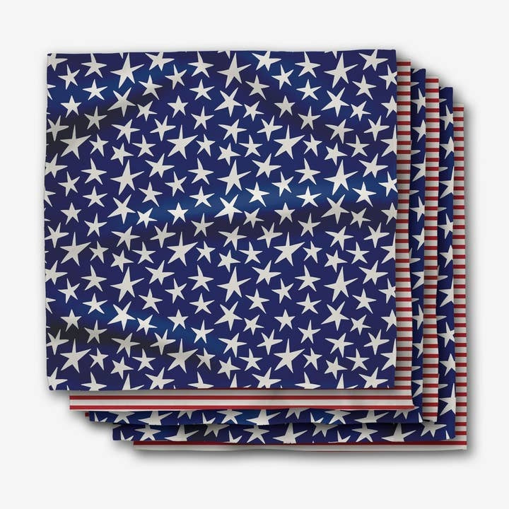 Set of six geosuede fabric dinner napkins featuring a stars-and-stripes pattern in red and white.
