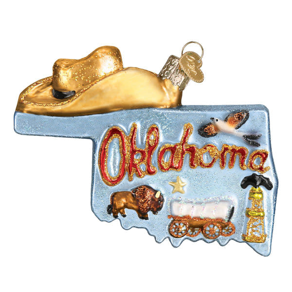 Mouth-blown glass ornament shaped like the State of Oklahoma with silver accents and hand-painted details.
