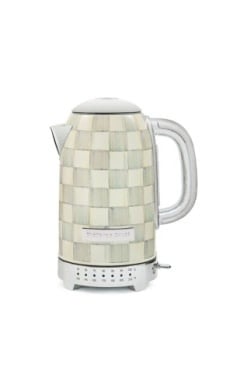 Stainless steel electric kettle with a checkered black and white pattern on the body.