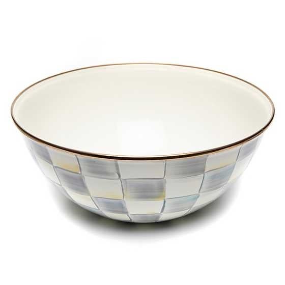 Hand-glazed steel everyday bowl with grey checkered enamel pattern over bronzed stainless rim