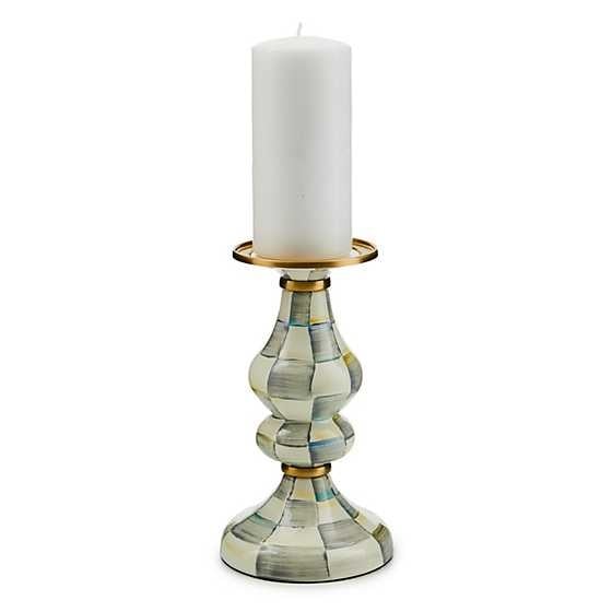 Hand-glazed steel pillar candlestick with hand-painted check pattern, brass accents, and bronzed stainless steel rim.