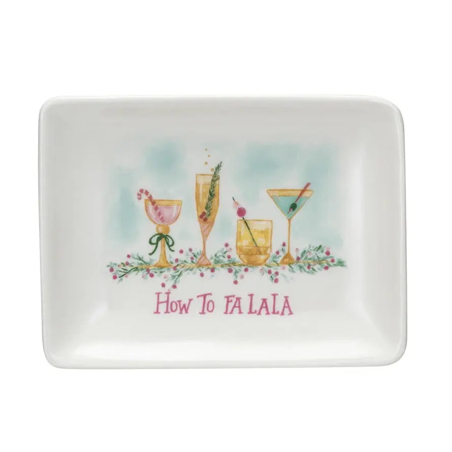 Stoneware holiday dish with 'How to FA LA LA' pattern featuring festive cocktails and seasonal motifs.