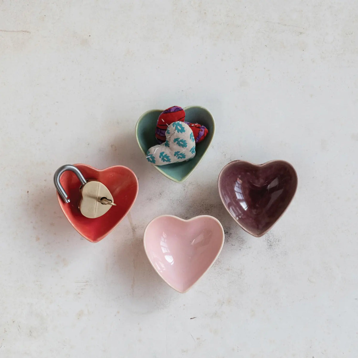 White stoneware heart-shaped serving dish with smooth rim.