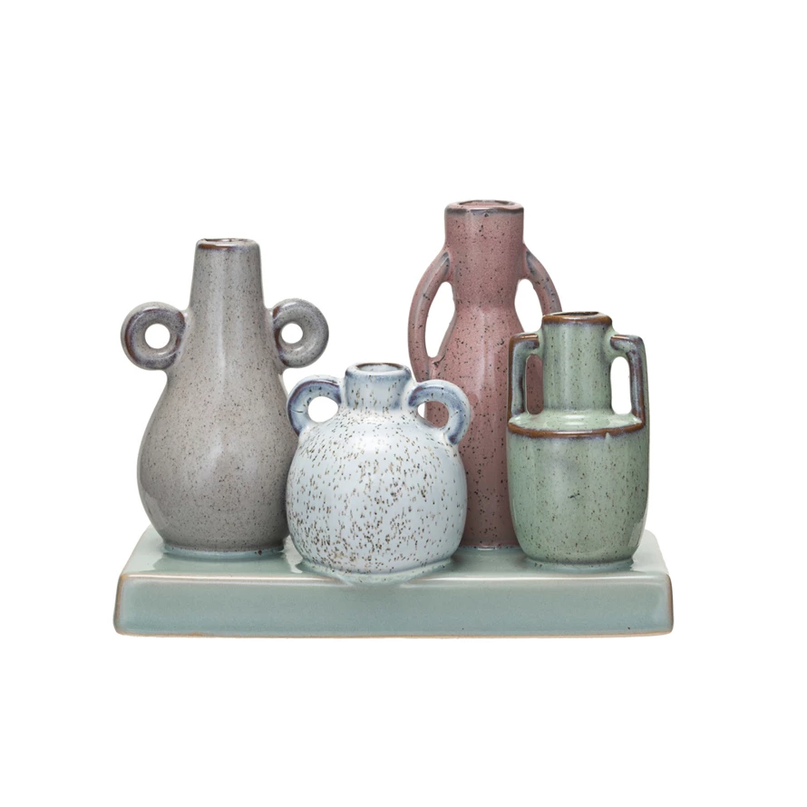 Rectangular stoneware vase with reactive glaze finish mounted on a base