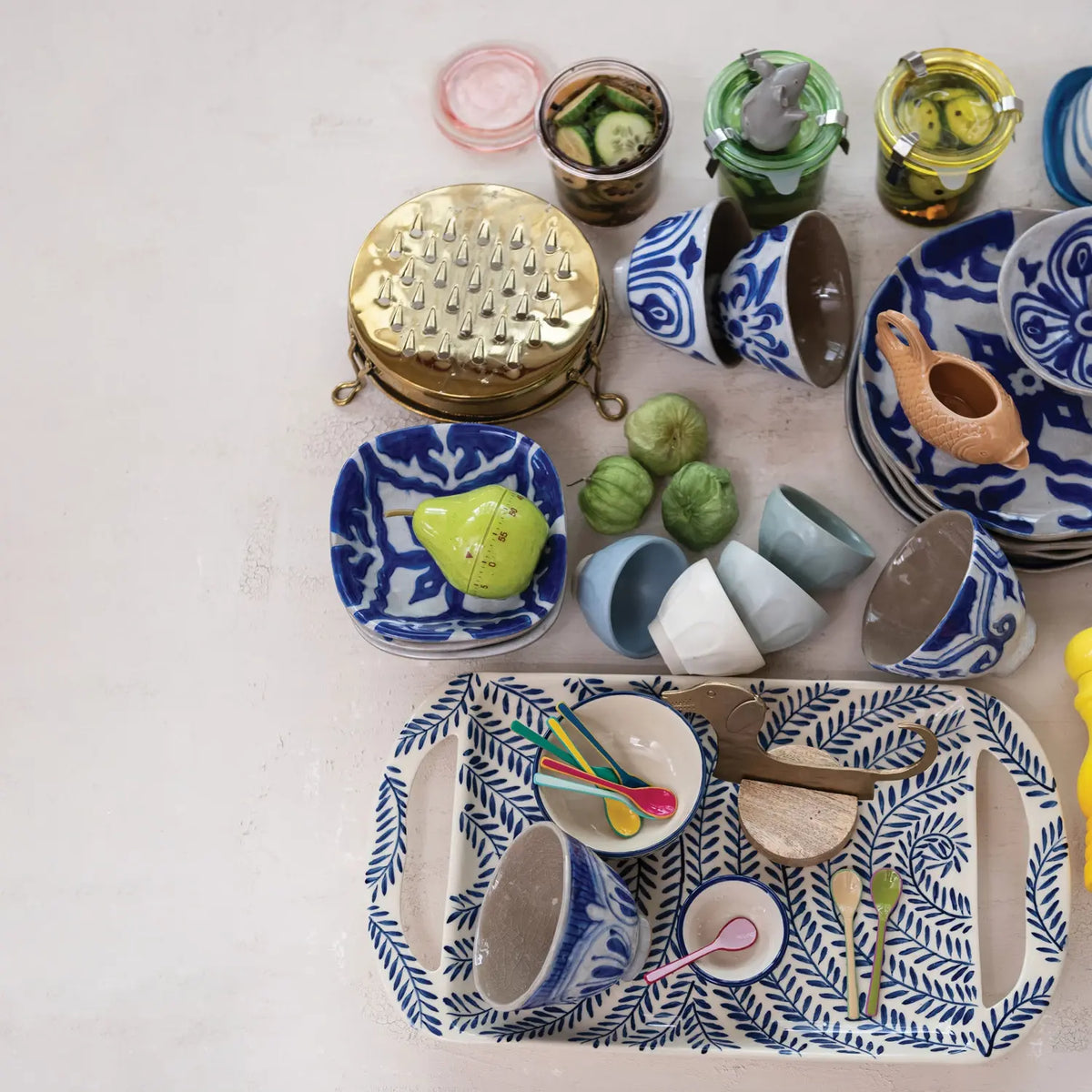 Hand-painted stoneware serving tray with botanical print, cream background, brown handles