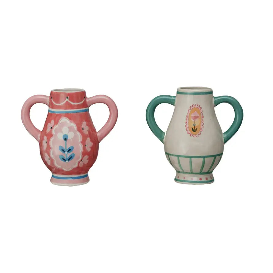 Hand-painted stoneware urn with floral motif, handles, and cream finish.