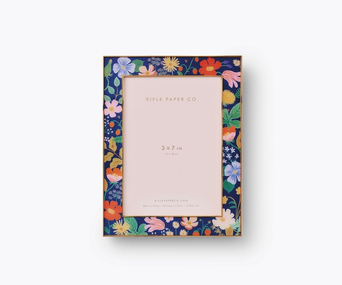 Strawberry Fields picture frame with floral gold accents on a velvet backing.