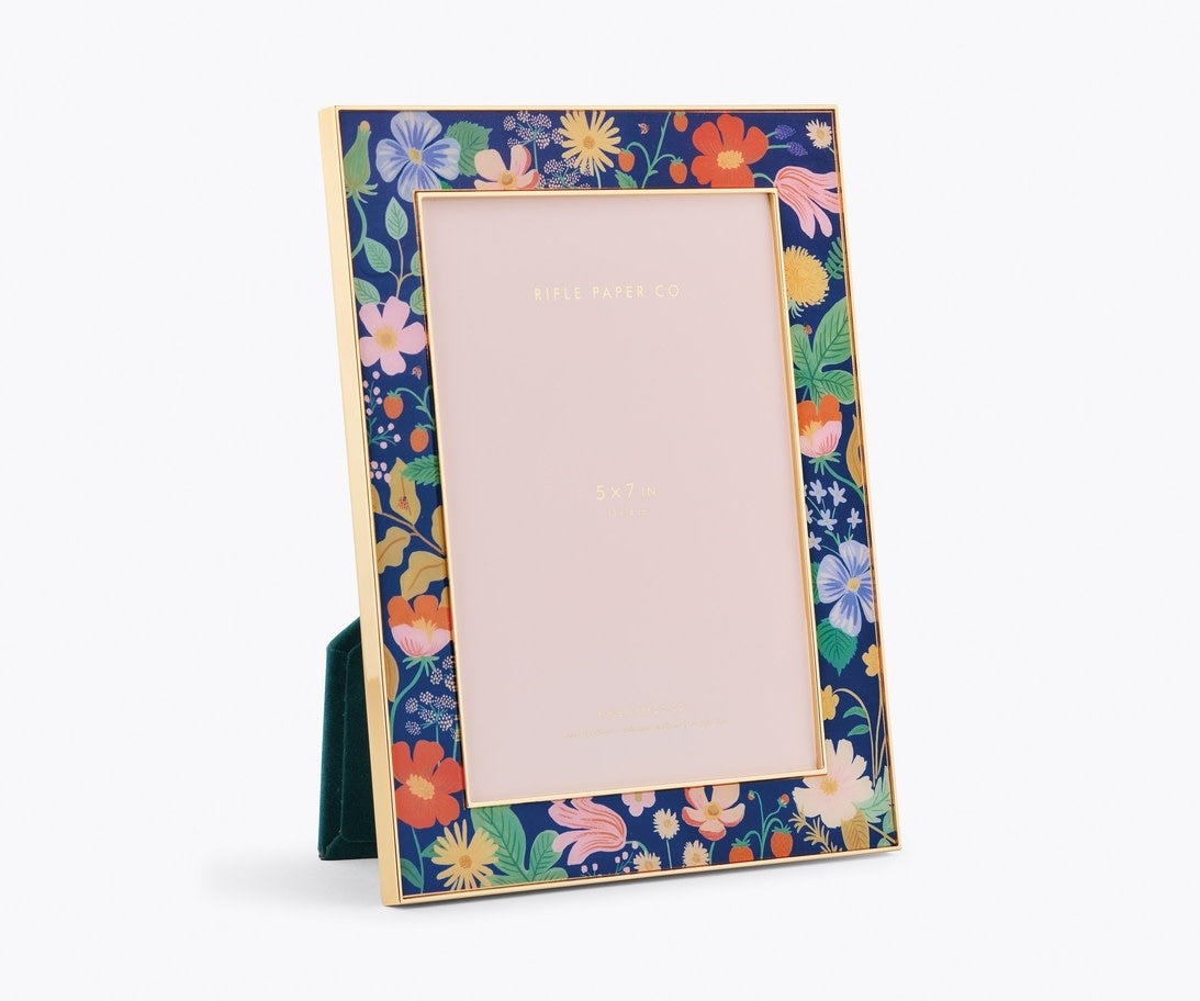 Strawberry Fields picture frame with floral gold accents on a dark velvet backing.