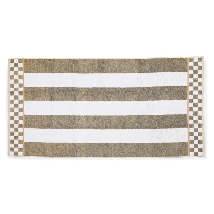 Cotton bath towel with horizontal stripes in contrasting tones.